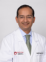 Dr. Manish Garg